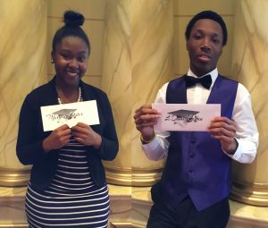 Black teenage young man and woman holding scholarships